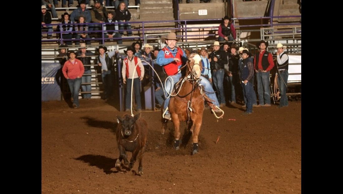 Zane Grigsby won fourth place both in the short round and the average in the Tie-Down Roping event at the first rodeo of the spring season held in Manhattan, Kan. —Photo by Dale Hirschman