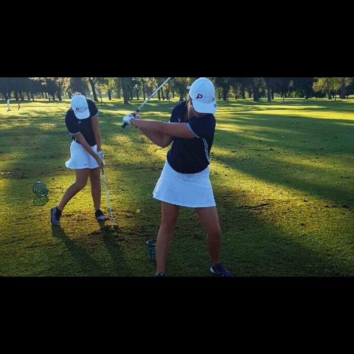 Jacey Steel and Emilee Smith warm up on the range before hitting the links at the NWOSU Ranger Invitational.-Courtesy photo 