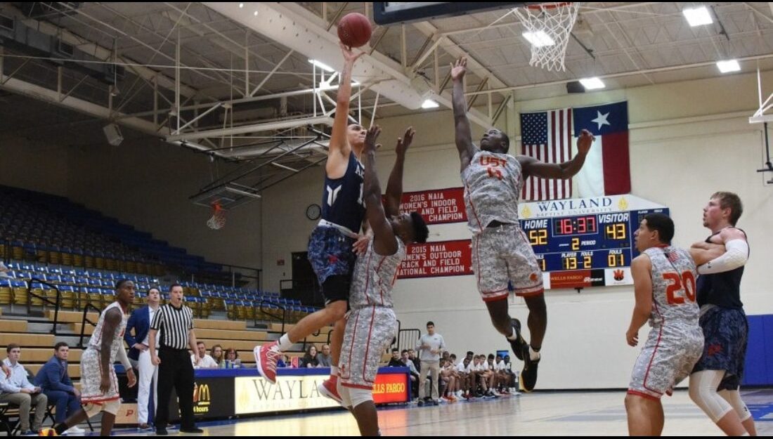 Baris Ulker goes up for a shot against St. Thomas in the Aggies' season-opener.-Courtesy photo 