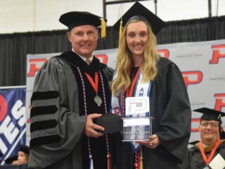 Hannah Hammack (right) was named the 2019 J.R.P. Sewell award winner during the 109th Panhandle State Commencement. —Photo by Danae Moore